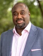 Headshot of a man in business attire