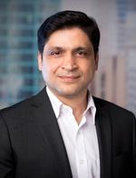 Headshot of a man in business attire