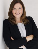 Headshot of a woman in business attire